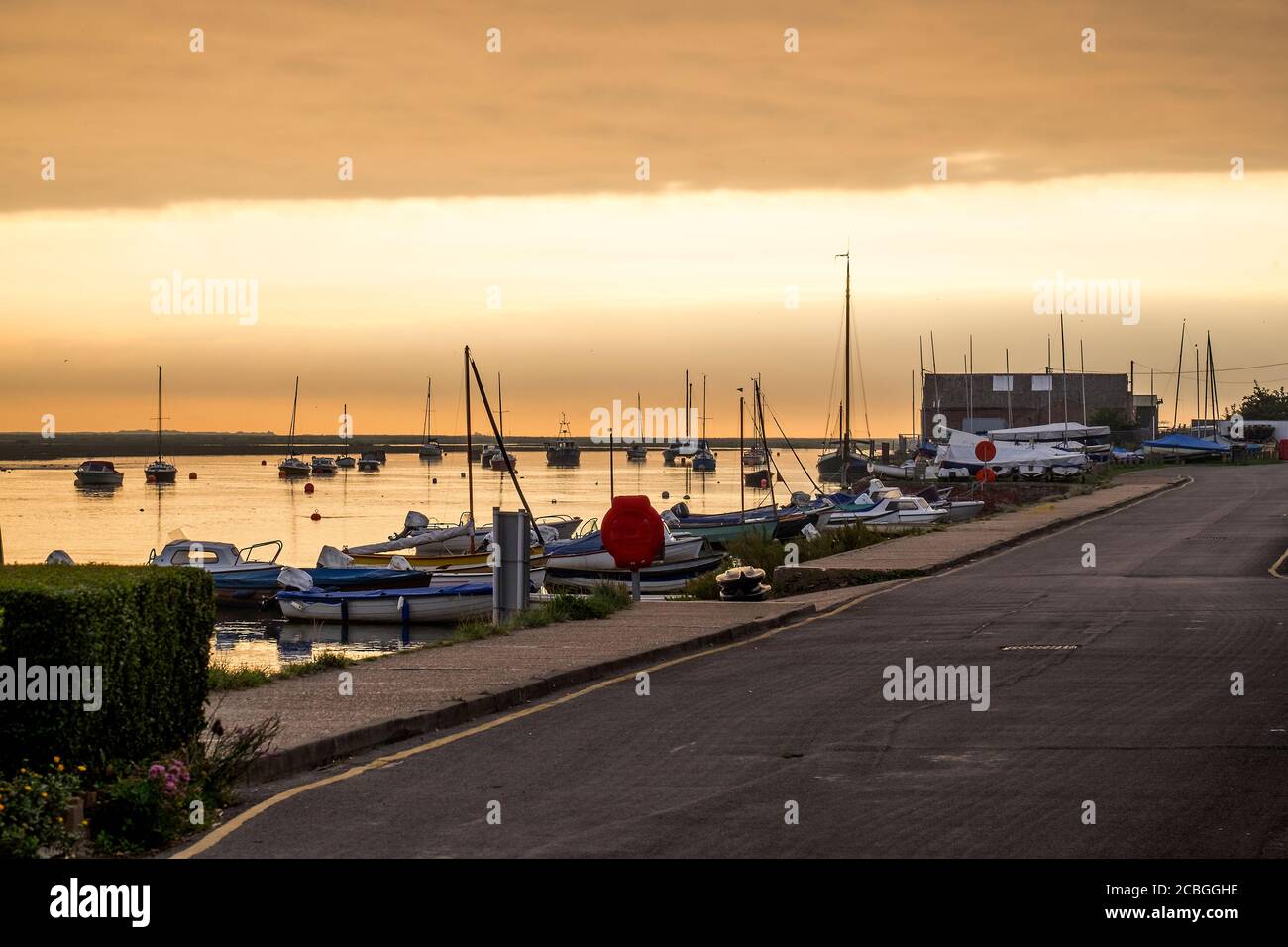 Harbour sunrise scene Stock Photo - Alamy