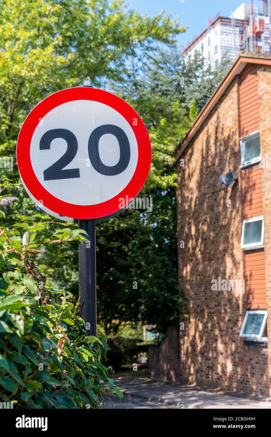 20 mph (Miles Per Hour) British road speed limit sign on residential built up area Stock Photo
