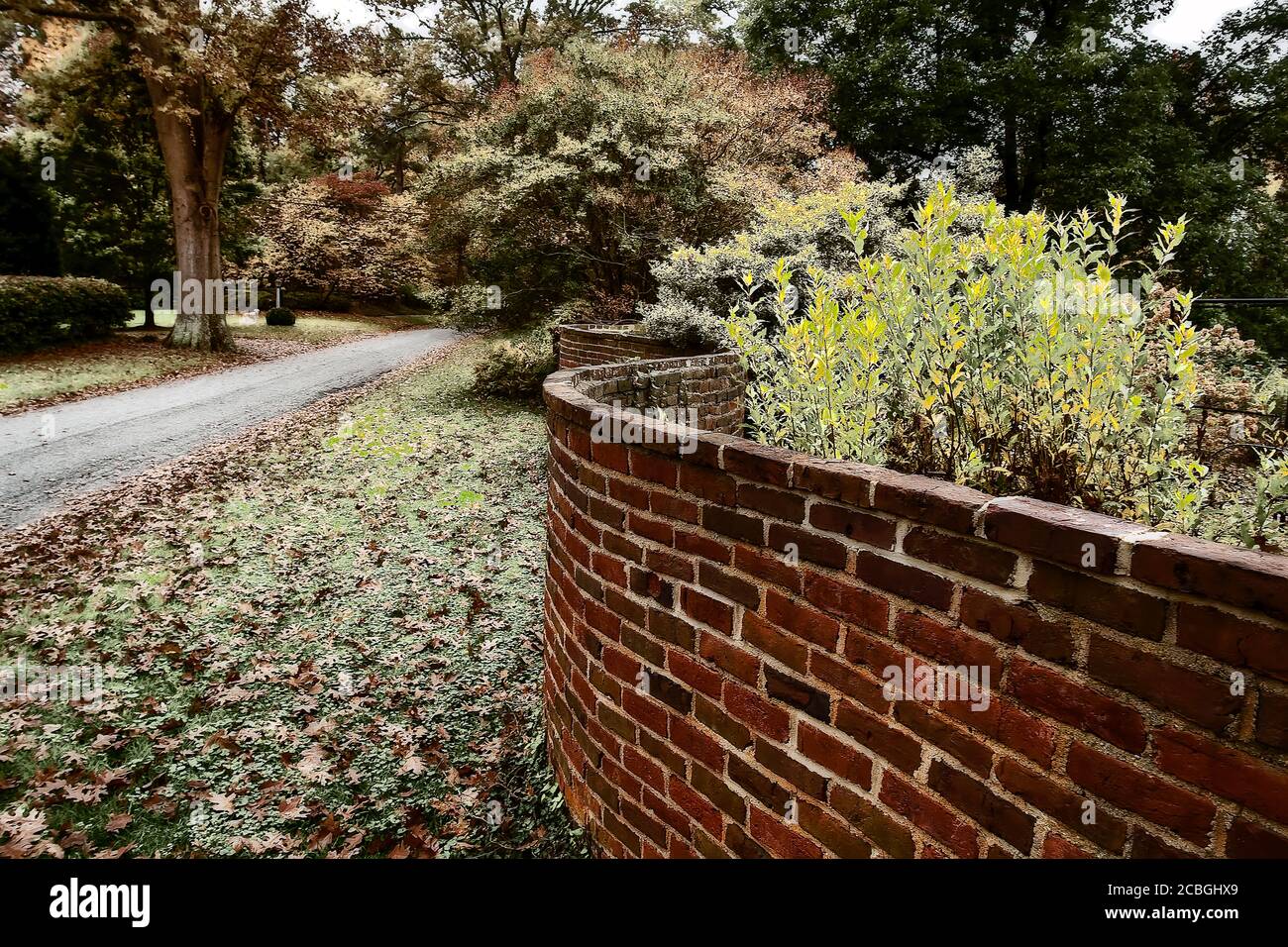 Curved Brick Garden wall Stock Photo