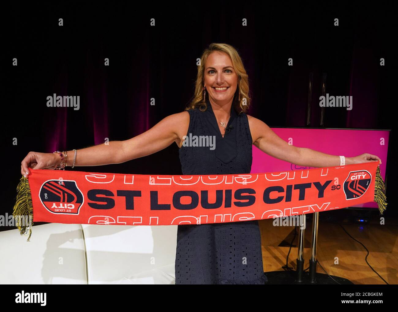 St. Louis, United States. 13th Aug, 2020. Team CEO Carolyn Kindle Betz, displays the name of the soccer team, their colors and crest during a virtual press conference at Harris Stowe State University in St. Louis on Thursday, August 13, 2020. The name of the team scheduled to play in 2023 is the St. Louis City SC, with the colors being red and navy blue. Photo by Bill Greenblatt/UPI Credit: UPI/Alamy Live News Stock Photo