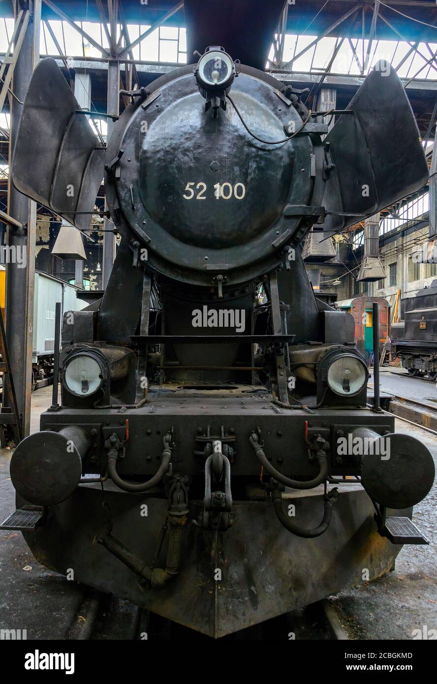 Front view of a restored old steam locomotive in a workshop, Austria Stock Photo
