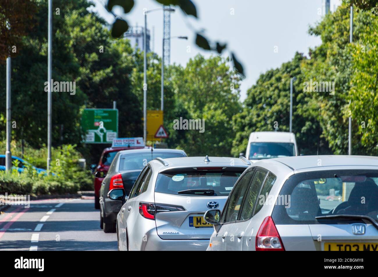 Cars queuing behind a Learner driver Stock Photo