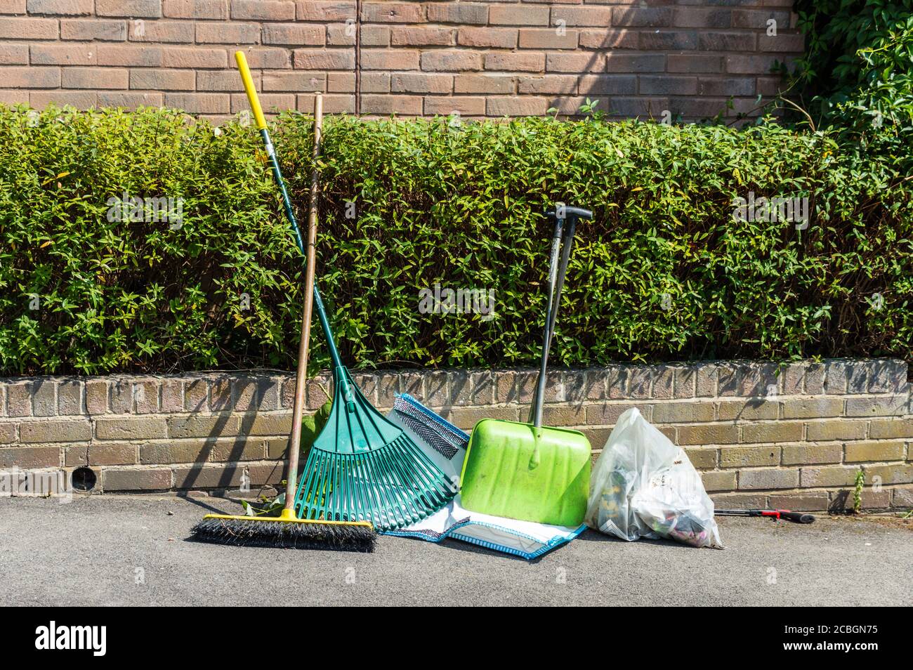 Gardening and cleaning up tools Stock Photo Alamy