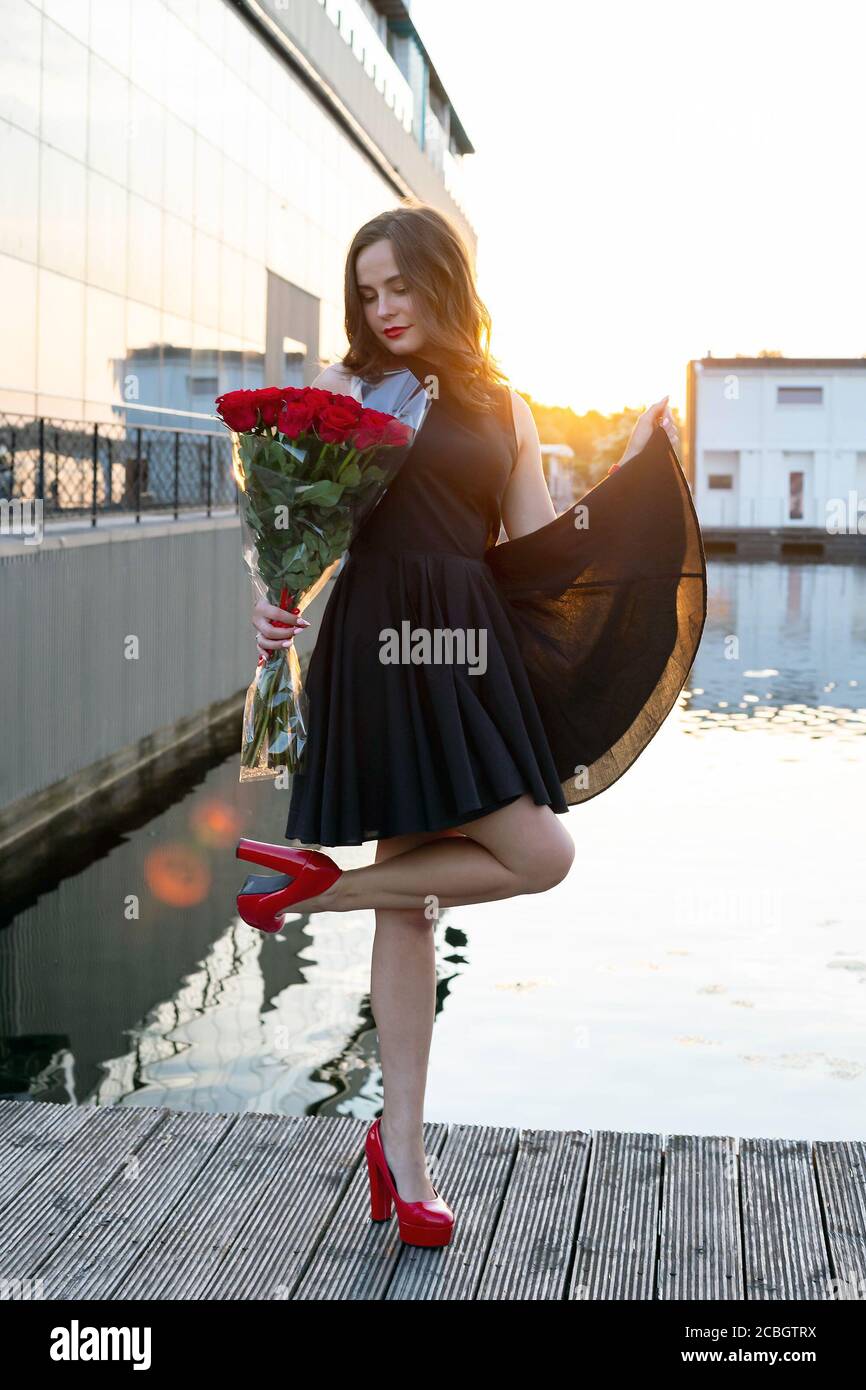 Short black dress store with red roses