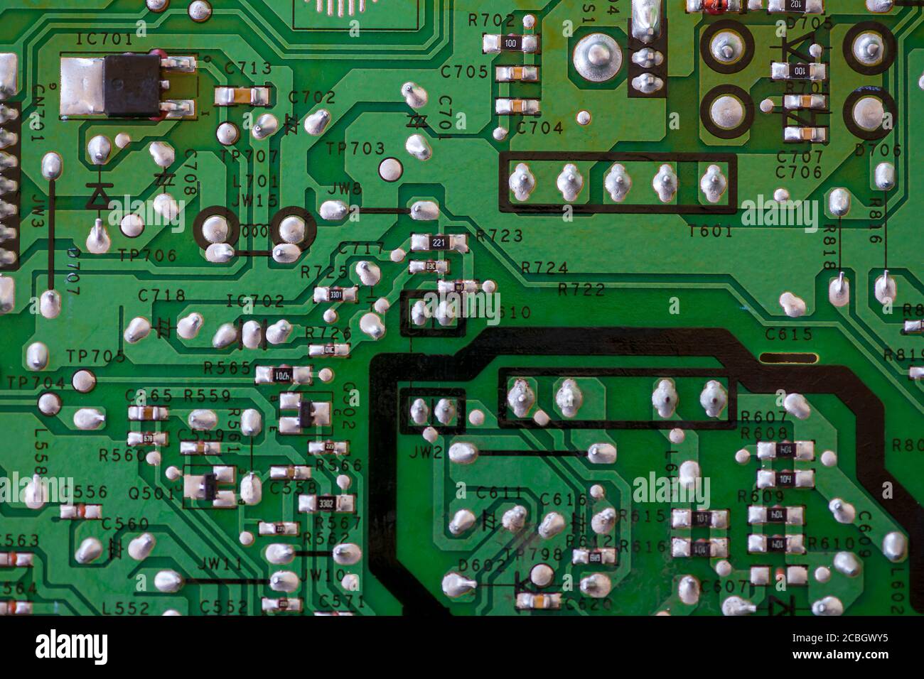 Close-up of electronic components. SMD resistors, capacitors, inductors and integrated circuits. Stock Photo