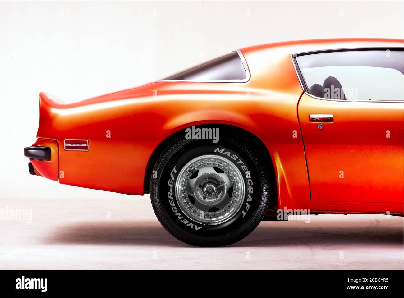 Izmir, Turkey - July 11, 2020: Close up shot of back mudguard and Side back view of a 1974 Pontiac Brand Trans am firebird in a studio shot. Stock Photo