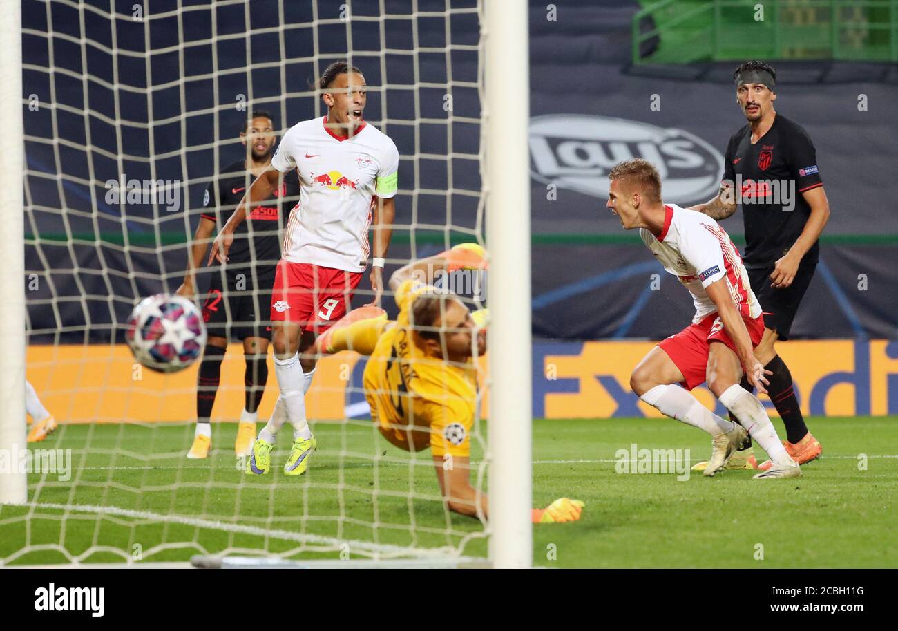 Lisbon, Deutschland. 13th Aug, 2020. firo Champions League Lisbon, 08/13/2020, football, UEFA Champions League, quarter finals, RB Leipzig - Atletico Madrid goal for Leipzig to make it 1-0 through Dani Olmo (2nd from right, 25, RB Leipzig)., UEFA regulations prohibit any use of photographs as image sequences and/or quasi-video, Only for journalistic purposes! Only for editorial use! PICTURE POINT/Sunday/Poolfoto/via/firosportphoto. | usage worldwide Credit: dpa/Alamy Live News Stock Photo