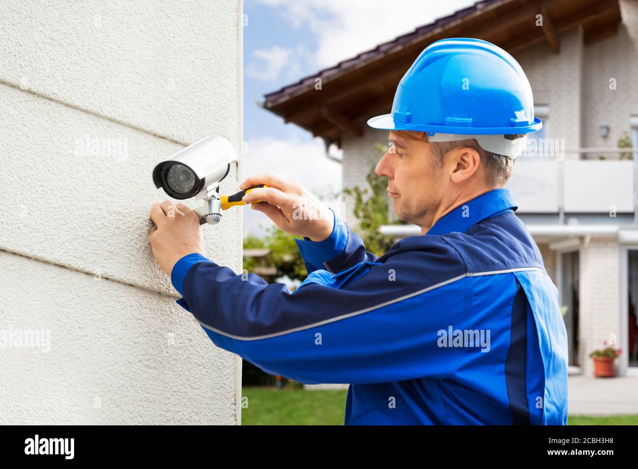 CCTV Security Camera Technician Professional And Electrician Stock