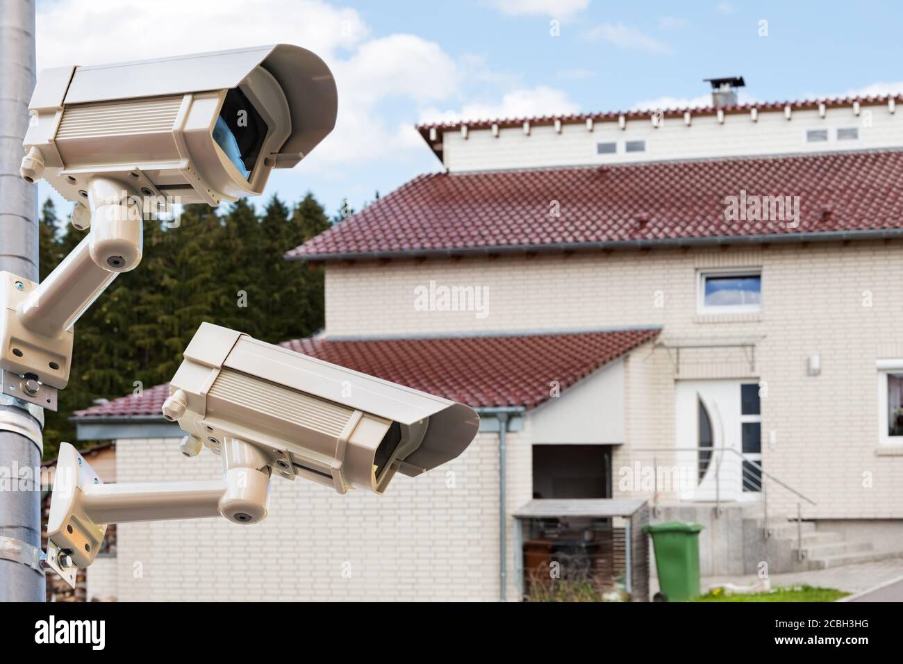 CCTV Security Video Cameras Watching Private House Stock Photo
