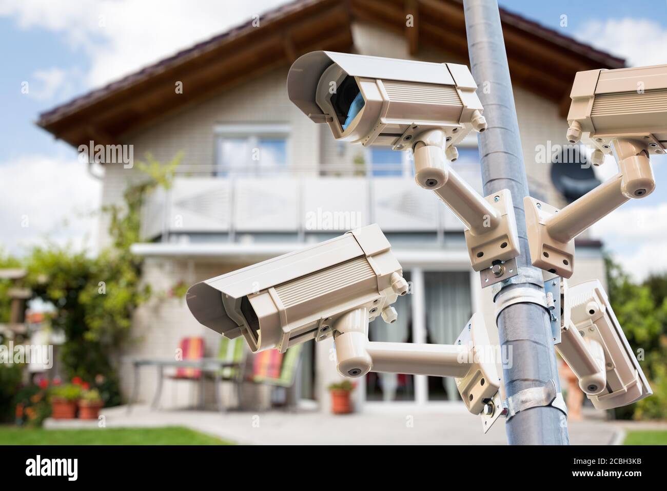 CCTV Security Video Cameras Watching Private House Stock Photo