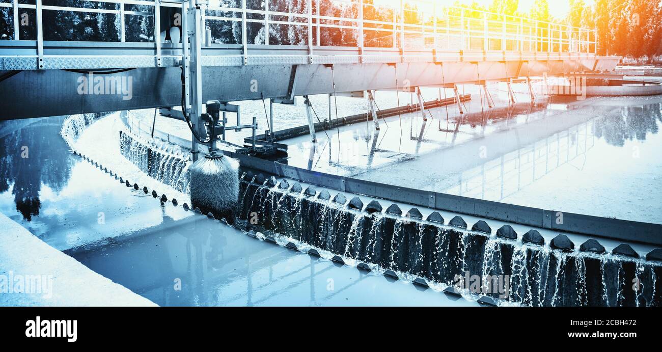 Aeration tank in wastewater and sewage treatment plant, industrial water recycling and purification, toned Stock Photo