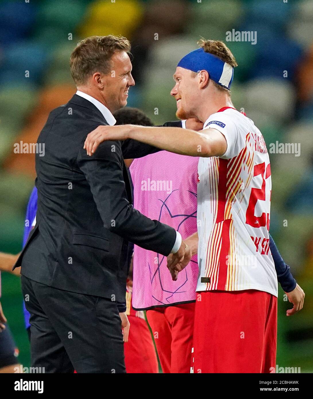 Lisbon, Portugal, 13th August 2020,  Schlussjubel: Trainer Julian Nagelsmann (RBL) und Marcel Halstenberg (RBL) in the quarterfinal UEFA Champions League match final tournament RB LEIPZIG - ATLETICO MADRID  in Season 2019/2020.  © Peter Schatz / Alamy Live News /Pool   - UEFA REGULATIONS PROHIBIT ANY USE OF PHOTOGRAPHS as IMAGE SEQUENCES and/or QUASI-VIDEO -  National and international News-Agencies OUT Editorial Use ONLY Stock Photo