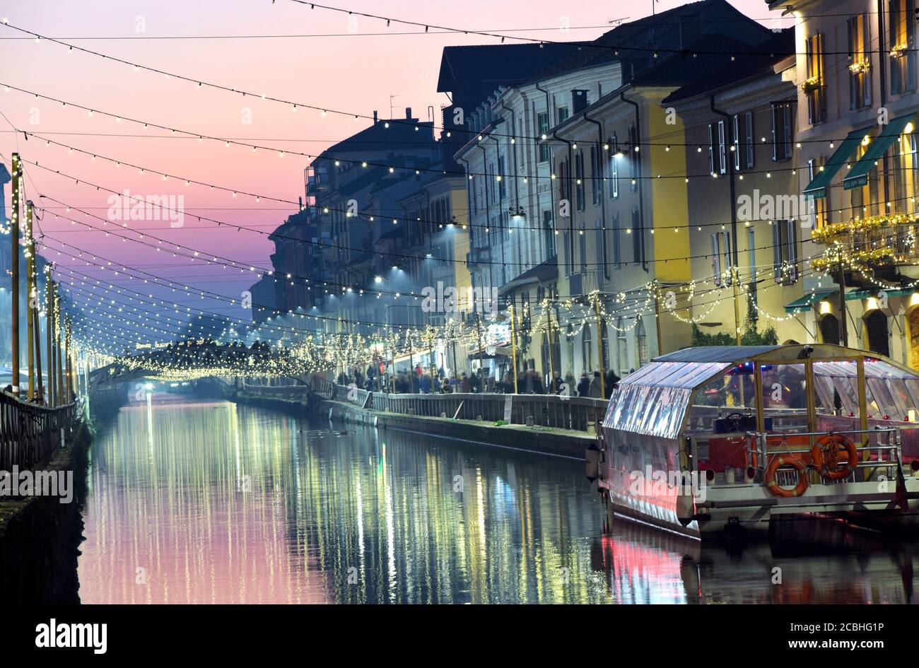 Scene at dusk  by the Canal in Milan, Italy Stock Photo