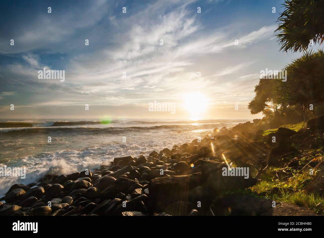 Ocean waves breaking on the rocky beach Stock Photo - Alamy