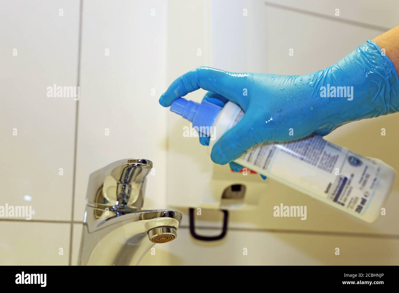 Cleaning and disinfection of a wash basin Stock Photo Alamy