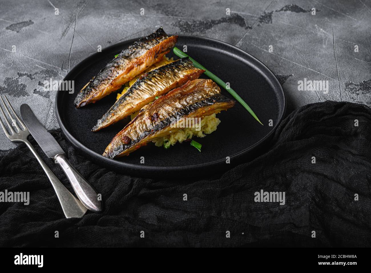 Roasted mackerel with garlic paprika and saffron with mashed potatoes