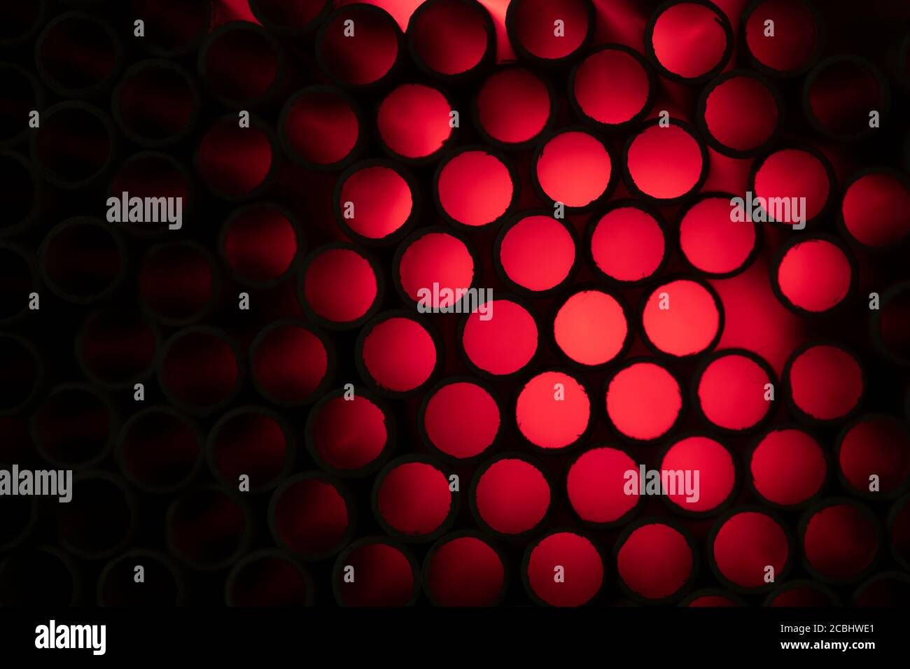 Industrial texture created using paper straws, playing with light Stock Photo