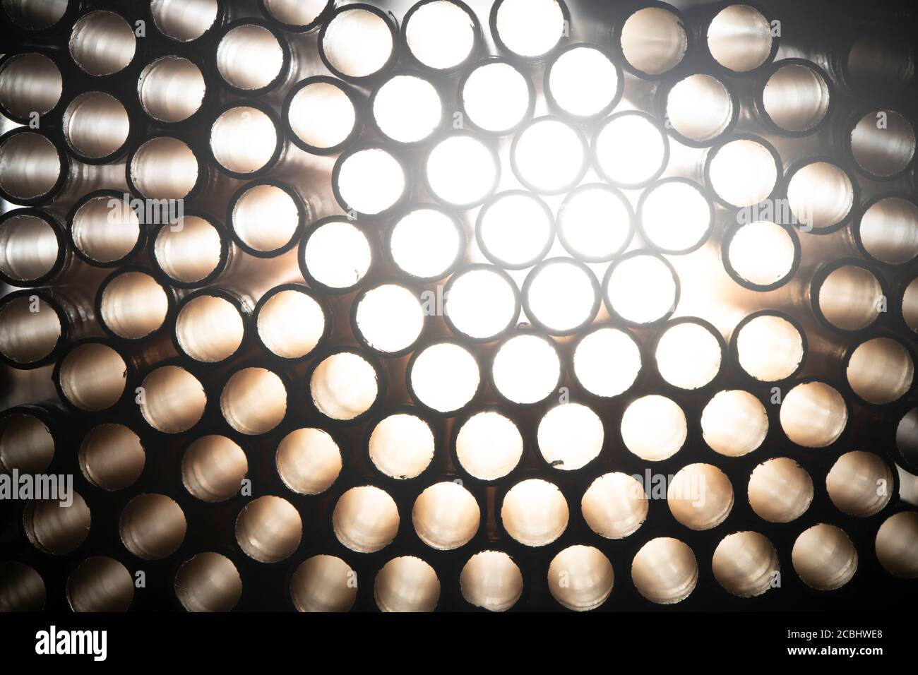Industrial texture created using paper straws, playing with light Stock Photo