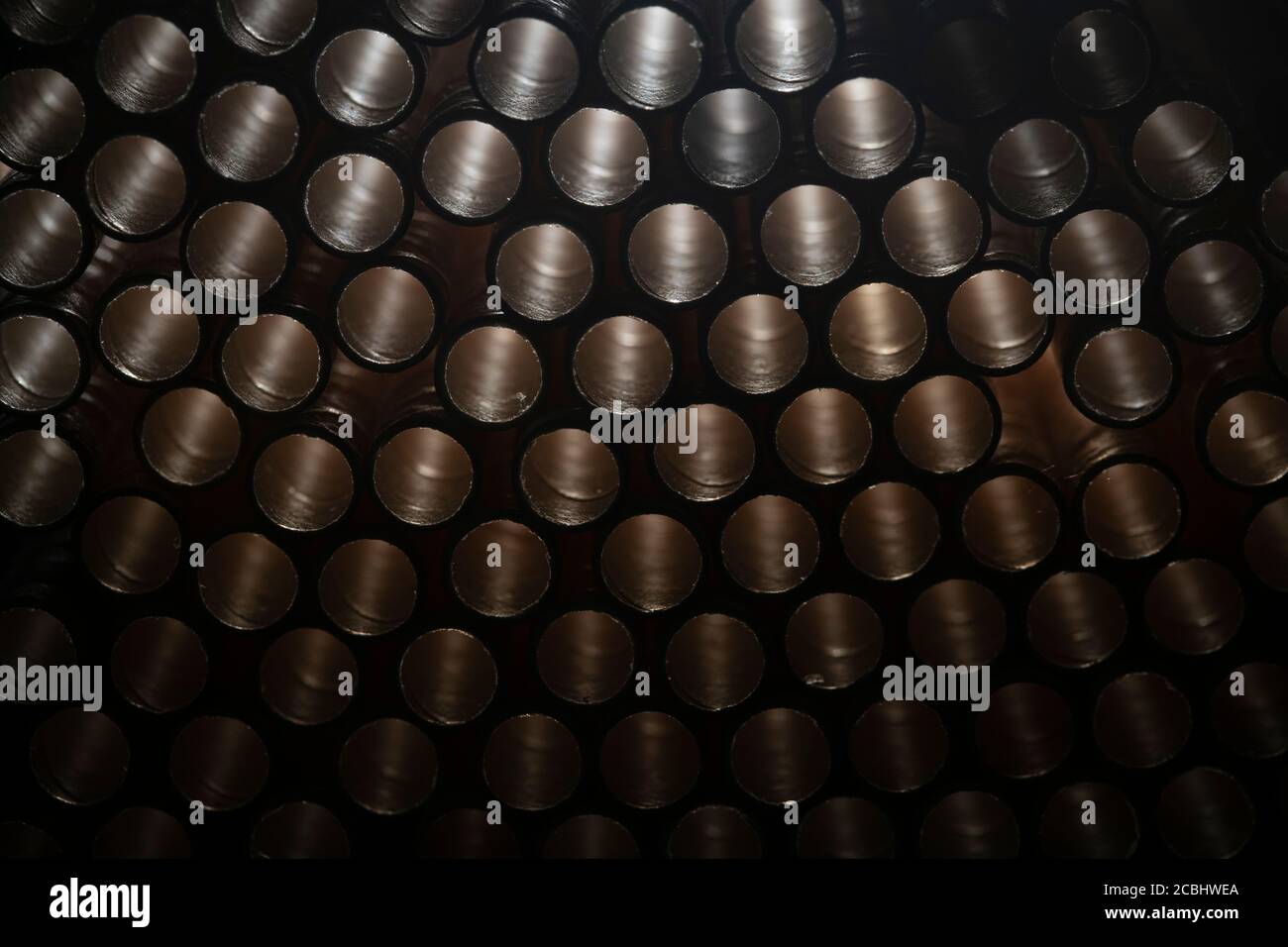 Industrial texture created using paper straws, playing with light Stock Photo