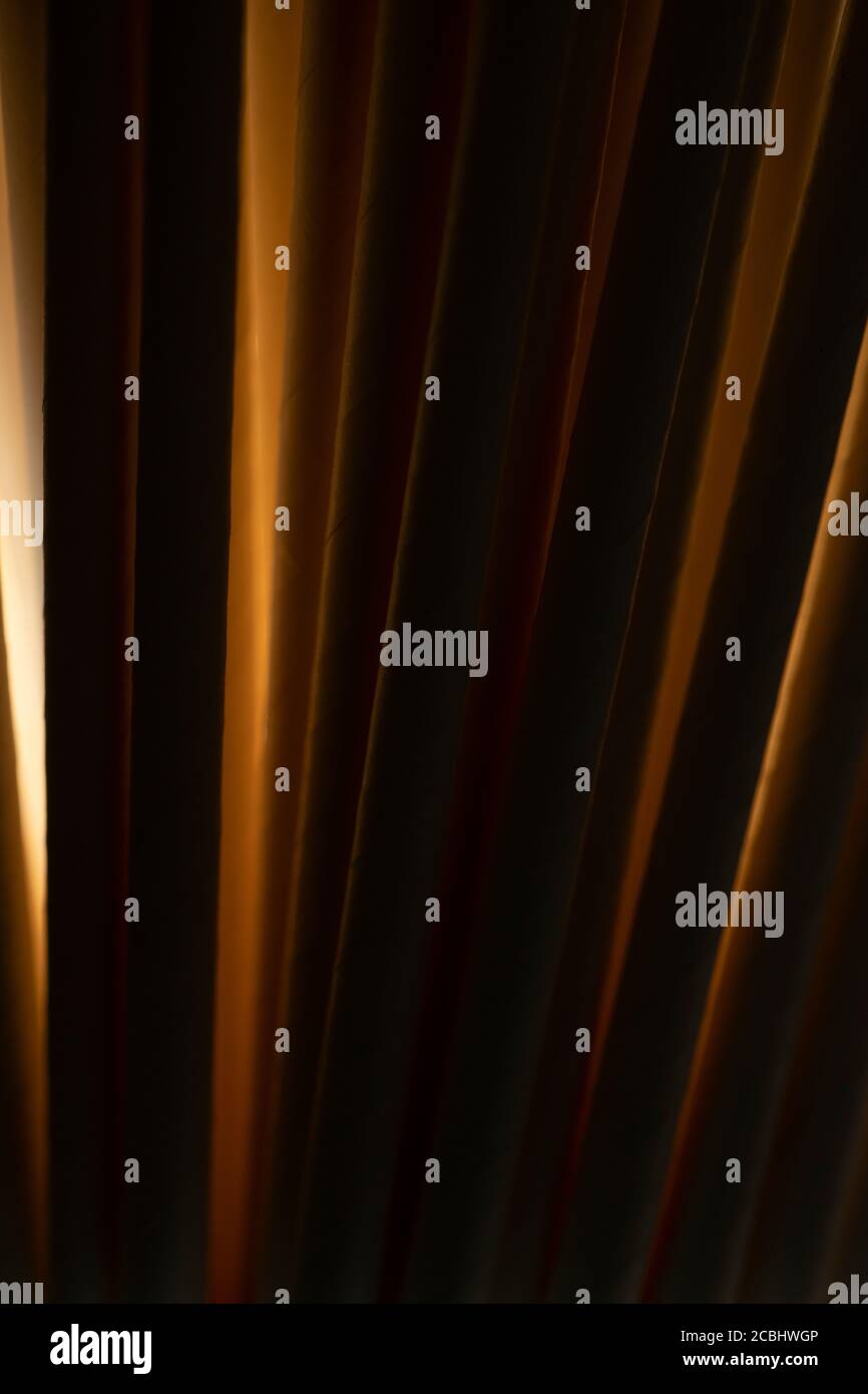 Industrial texture created using paper straws, playing with light Stock Photo