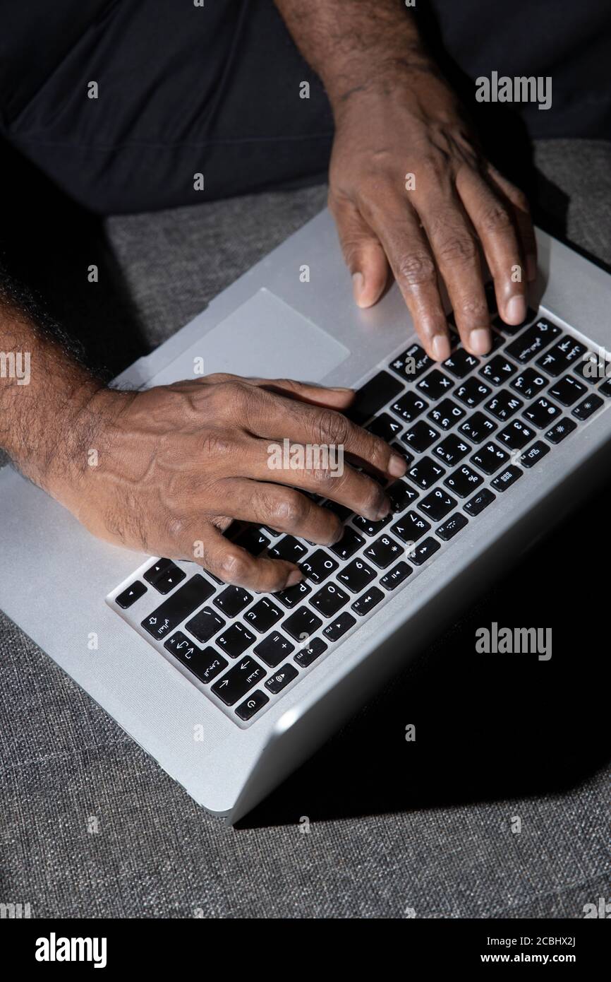 Businessman using laptop computer in the office stock photo Stock Photo