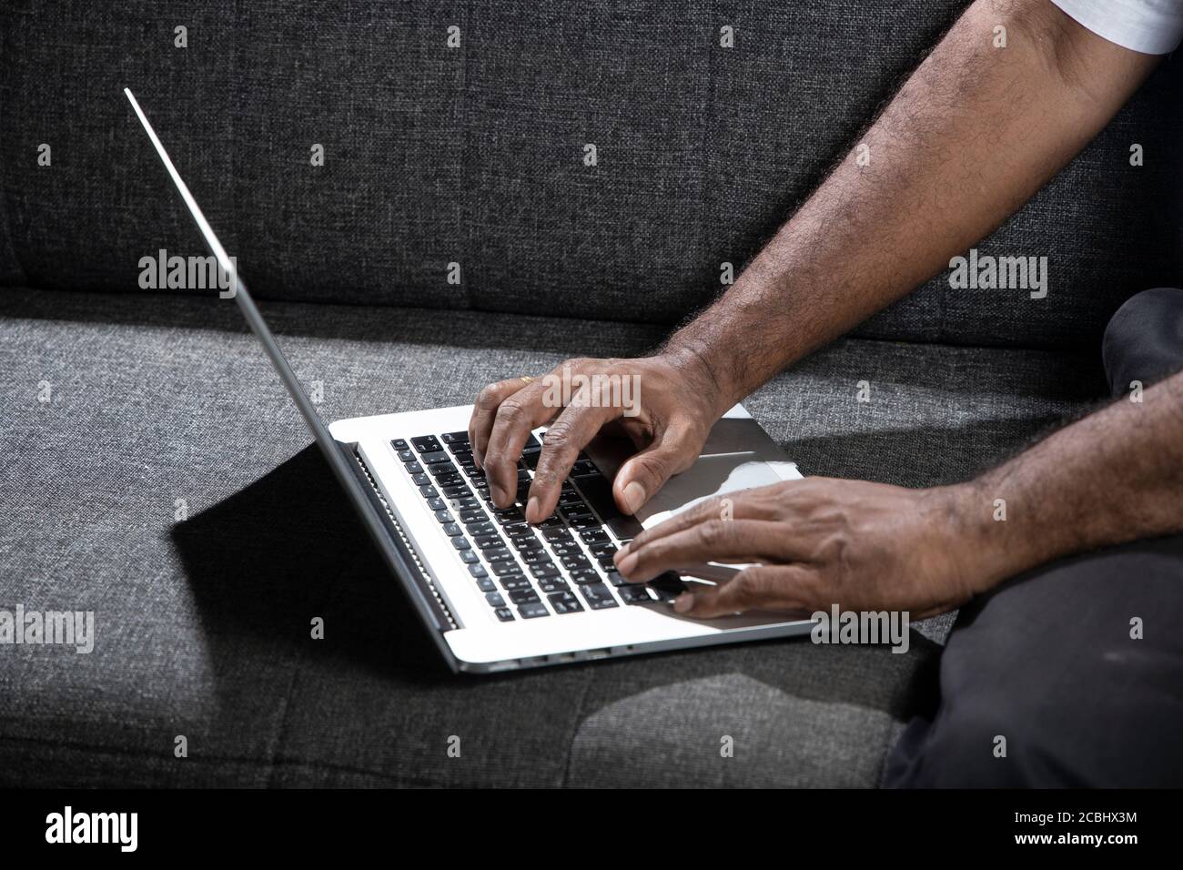 Businessman using laptop computer in the office stock photo Stock Photo