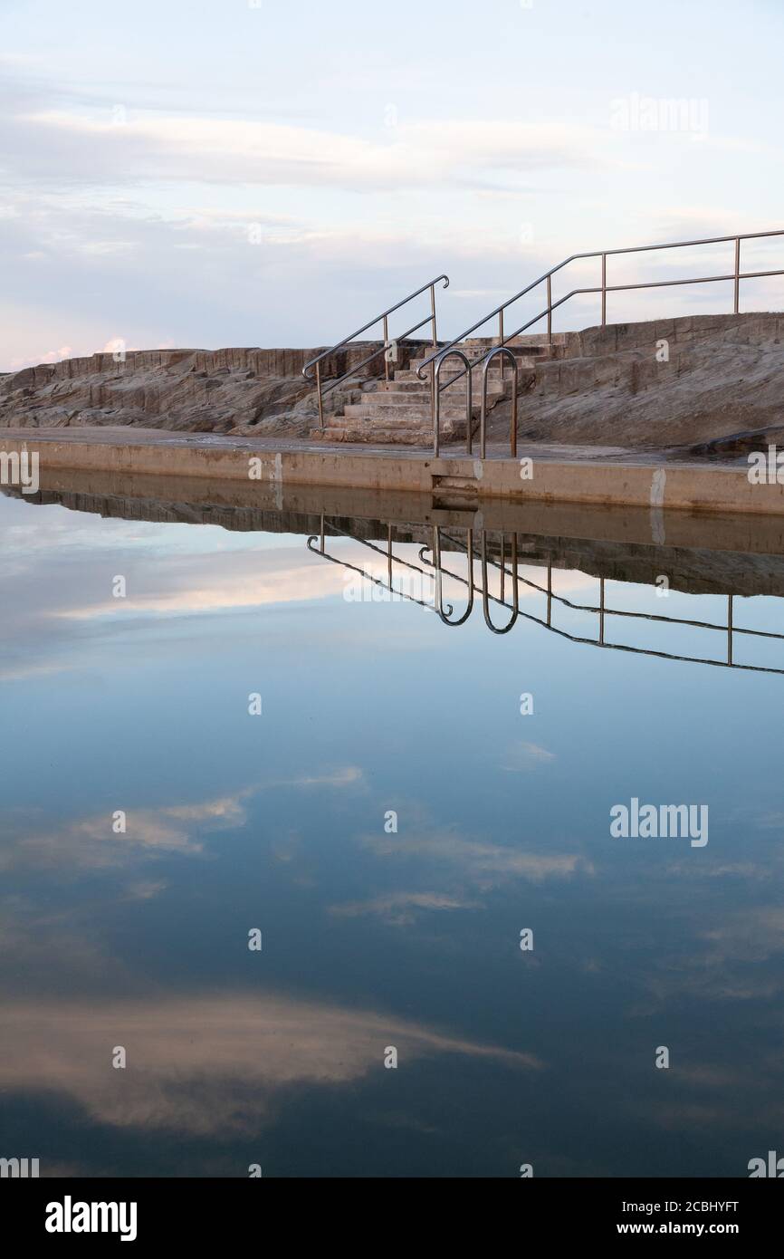 Cool refections at the Ocean Pool, Yamba, New South Wales, Australia Stock Photo