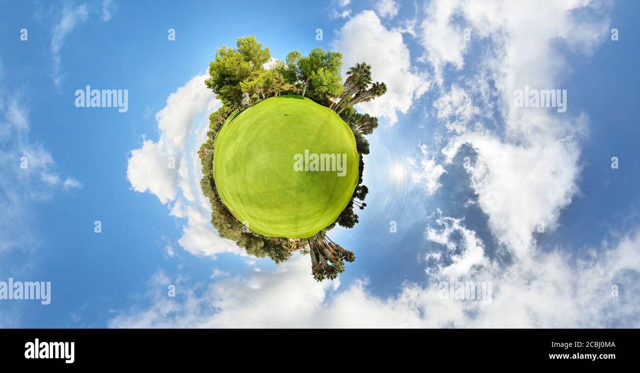 mini world 360 degree golf course green on a sunny day with clouds. golf concept Stock Photo