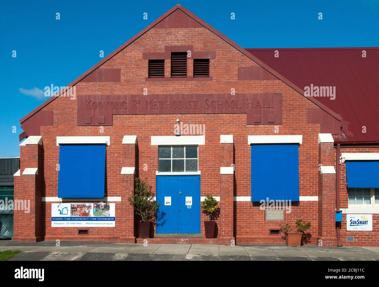 A 1920s Methodist school hall has become a multipurpose Community House and childcare centre (and occasional polling both) in South Caulfield, Melbour Stock Photo