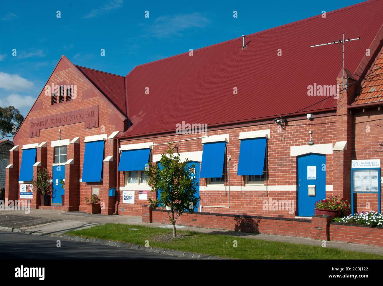 A 1920s Methodist school hall has become a multipurpose Community House and childcare centre (and occasional polling both) in South Caulfield, Melbour Stock Photo