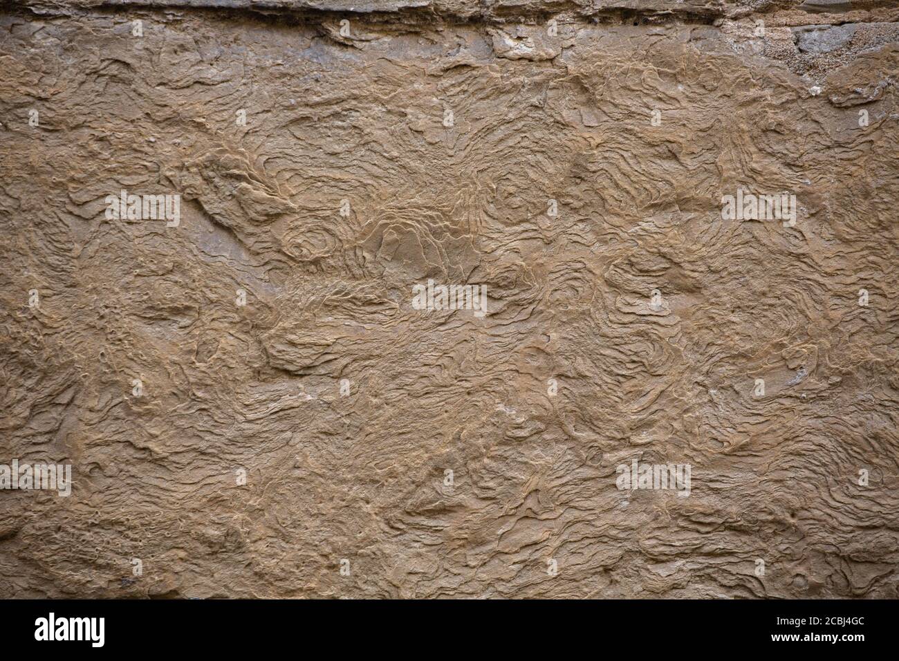 Exfoliating texture of old building stone. Close up shot. Abstract grunge background Stock Photo