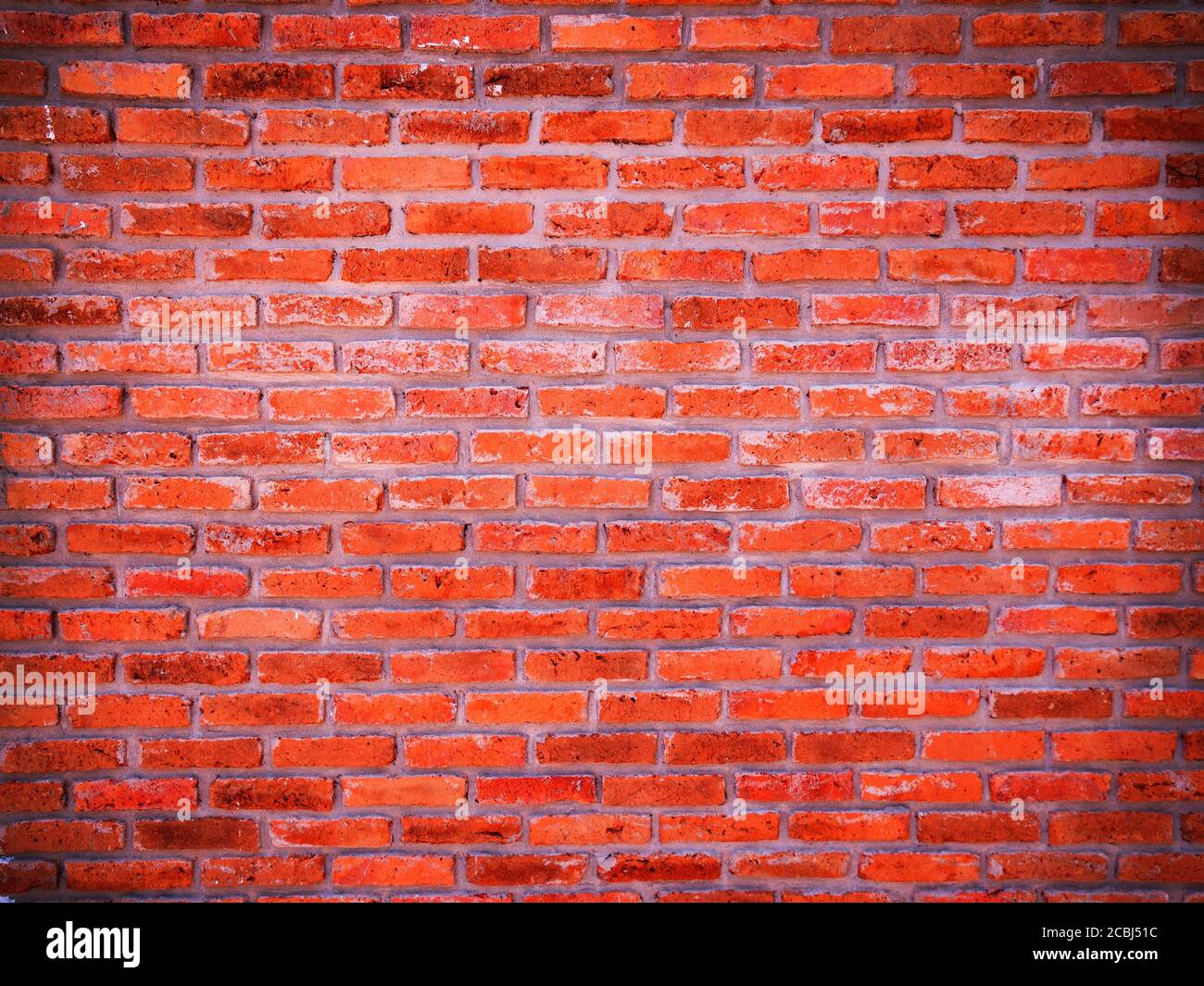 Background of abstract old grunge red brick wall pattern texture. Great for graffiti inscriptions. Stock Photo