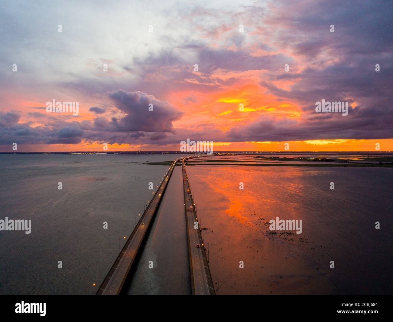 Mobile Bay and interstate 10 bridge at sunset Stock Photo