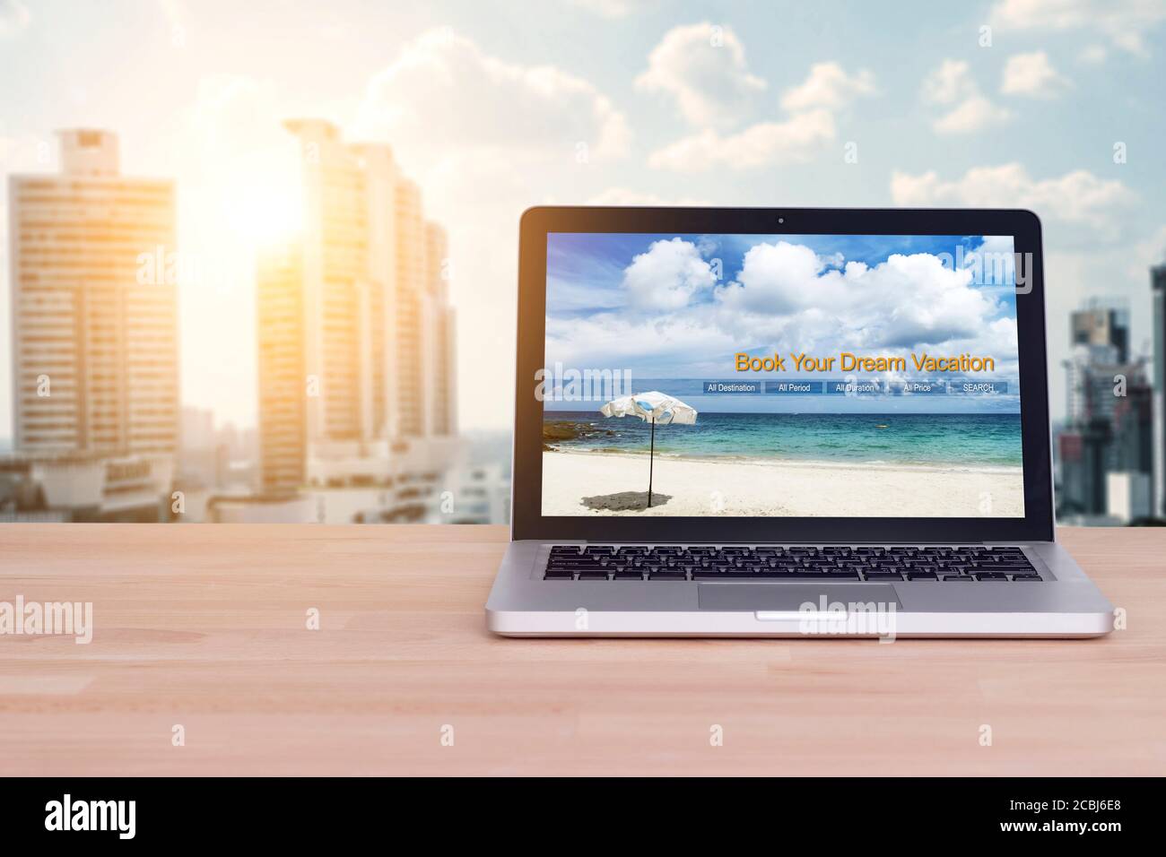 Travel, holiday , vacation planning concept : laptop with website book your dream vacation on screen at office work space for business people planning Stock Photo