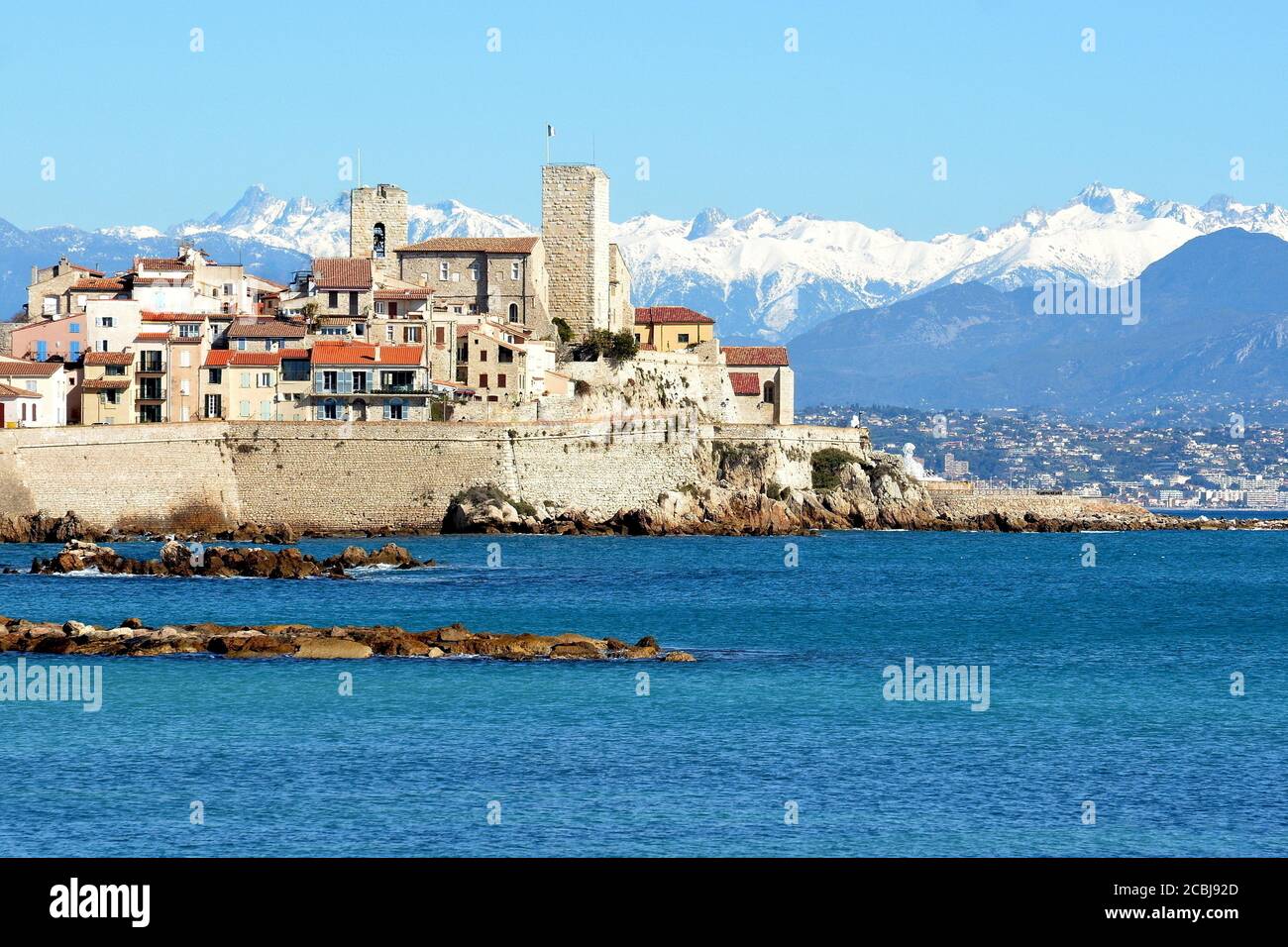 France, french riviera, The old town of Antibes with its ramparts and the snowy Mercantour massive. Stock Photo