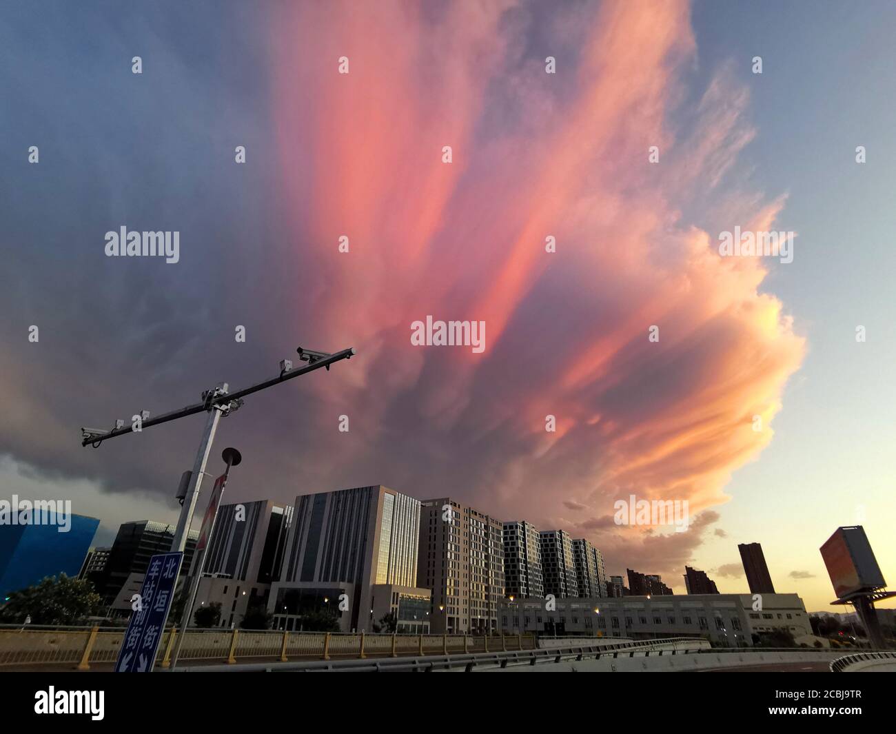 Huhehaote, Huhehaote, China. 14th Aug, 2020. NeimemgguÃ¯Â¼Å'CHINA-The magic! On August 9, 2020, a qimei ''angel wings'' fire cloud was seen over Hohhot, Inner Mongolia. The curling clouds look like angels' wings, and many residents have been exposed to the sun and photographed the burning clouds, which shocked them. Credit: SIPA Asia/ZUMA Wire/Alamy Live News Stock Photo