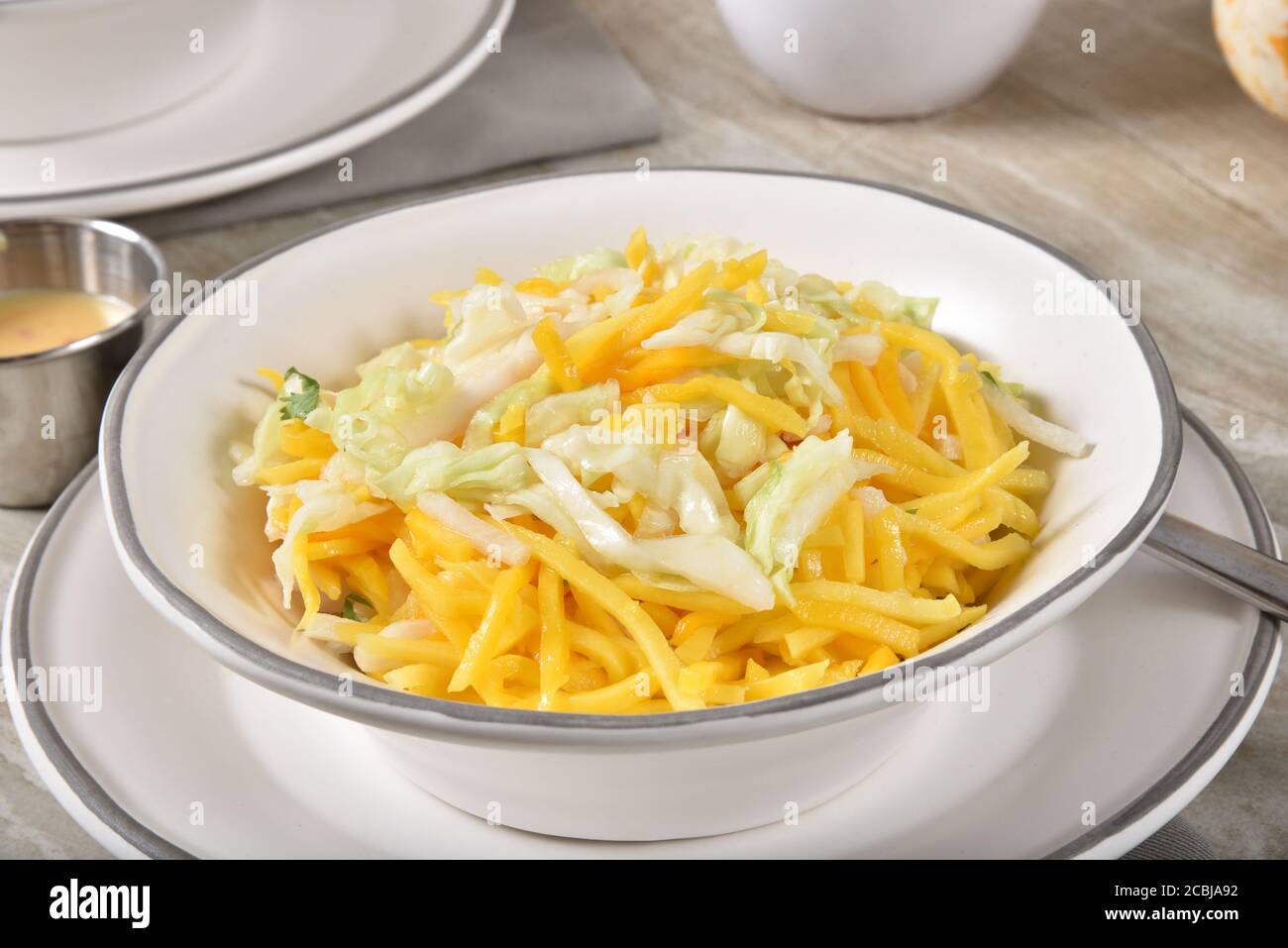 Delicious fruit salad with julienne mango and jicama and bits of cabbage Stock Photo Alamy