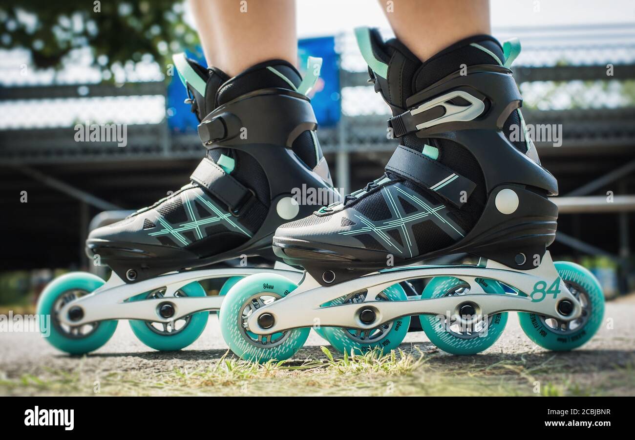 Female legs in inline roller skates closeup in action. Extreme sport.  Concept about sport and leisure. Sport lifestyle. Fun time activity Stock  Photo - Alamy