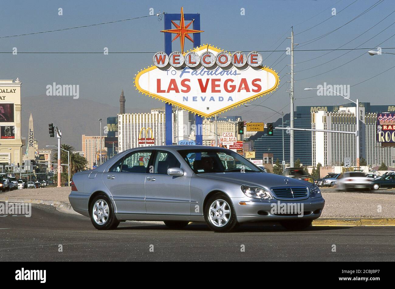 Mercedes Benz S Class 500 turning at the Las Vegas city road sign