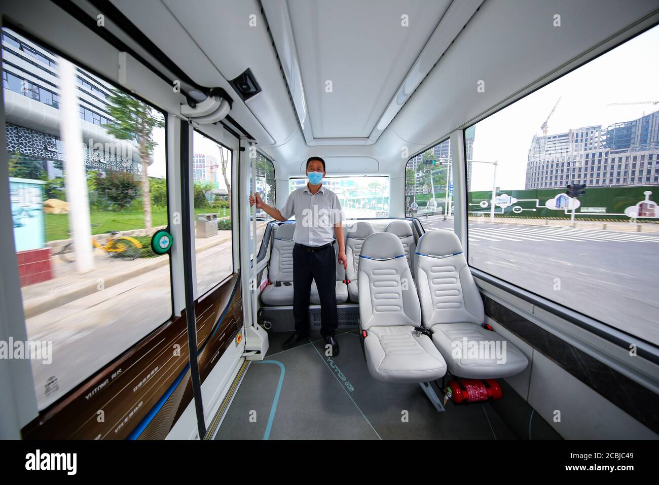 Zhengzhou, Zhengzhou, China. 14th Aug, 2020. Henanï¼Å'CHINA-On August 11, 2020, henan zhengzhou, zhengdong new district give wisdom island lake loop, yutong automated driving bus has run for a year, which is based on 5 g of L4 automated driving bus have highly intelligent, driven and autonomous obstacle avoidance, patrol intersection peers such as task can be accurate, complete, can also identify ambulances, fire engines, etc and take the initiative to give way.''Smart car smart road ubiquitous cloud'' is bringing great changes to zhengzhou citizens' travel. Despite being in operation Stock Photo
