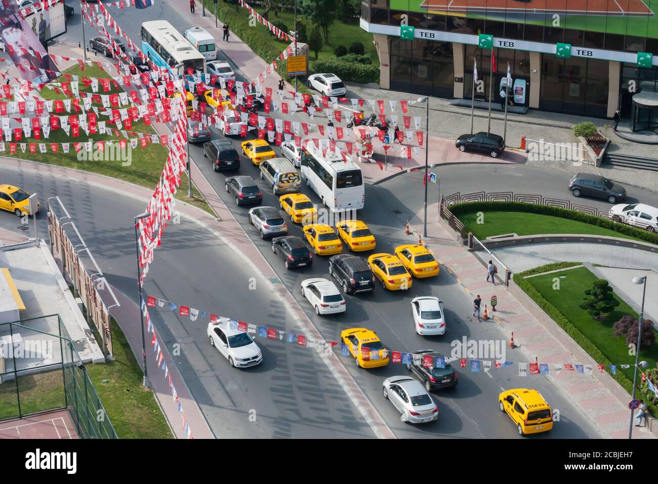 Istanbul, Turkey May 22 2015: aerial view of a street in Istanbul with many CHP political party flags and yellow taxi cabs. Stock Photo