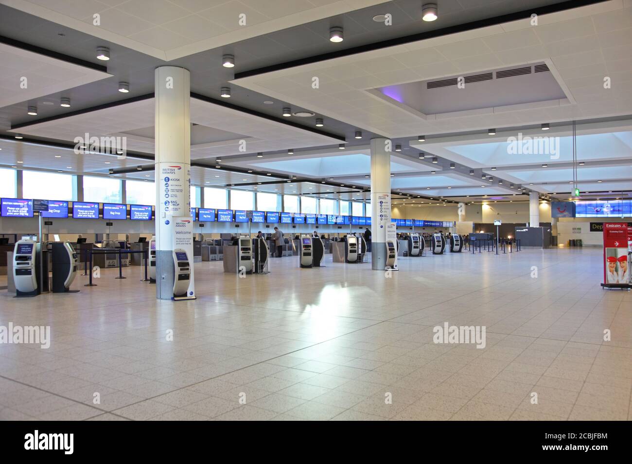 Deserted check-in desks at London's Gatwick Airport North Terminal, UK Stock Photo