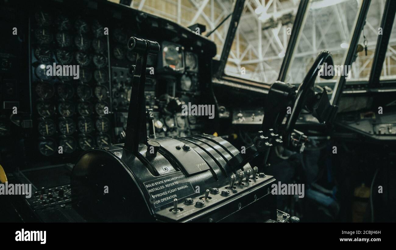 Console of an aircraft cockpit with its instruments. C130 Hercules, Firefighting aircraft Stock Photo