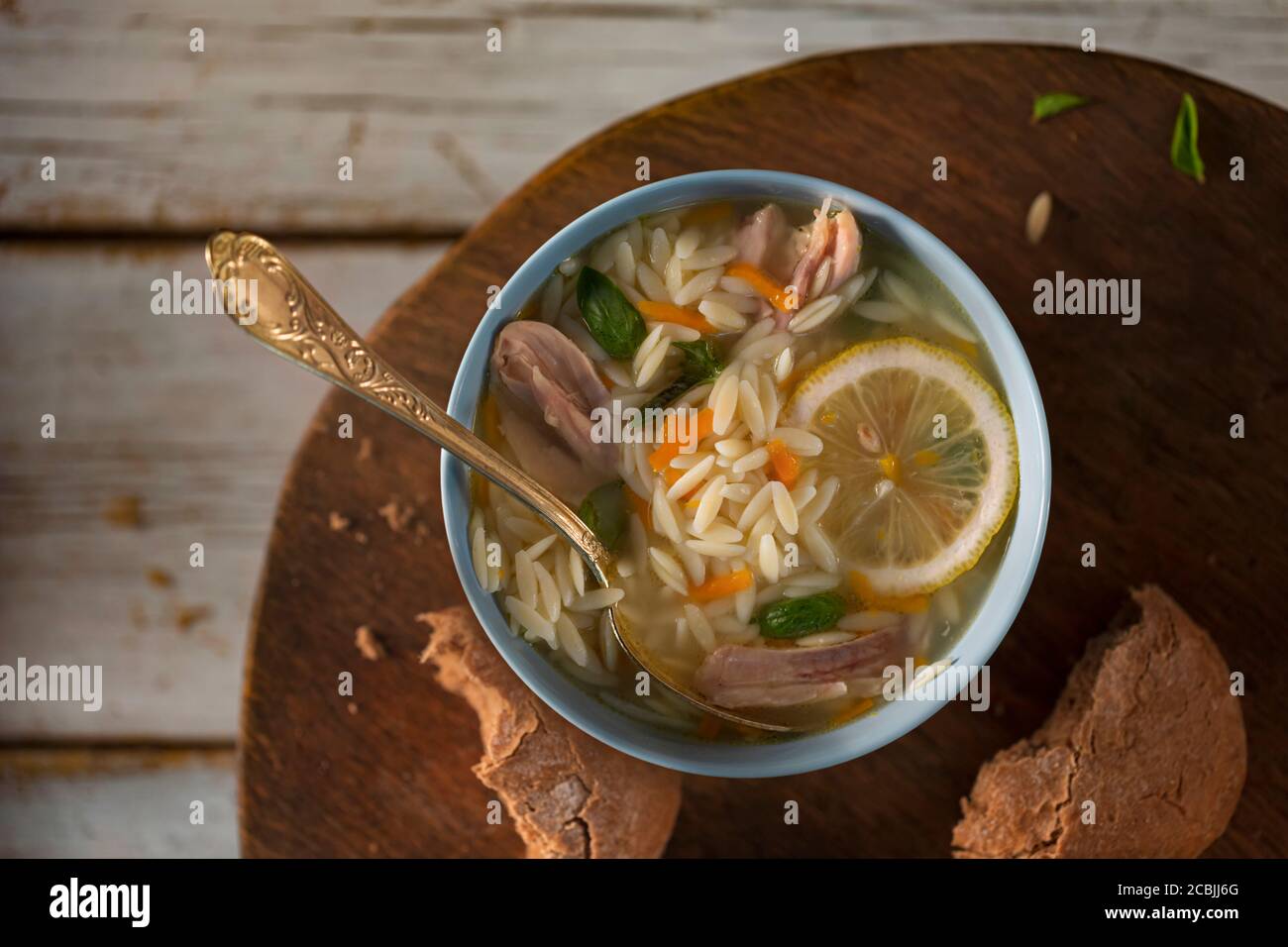 Italian soup with risoni pasta vegetables and chicken,top view Stock