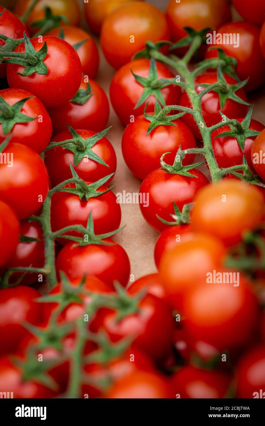 A full frame photograph of tomatoes for sale on a market stall Stock ...