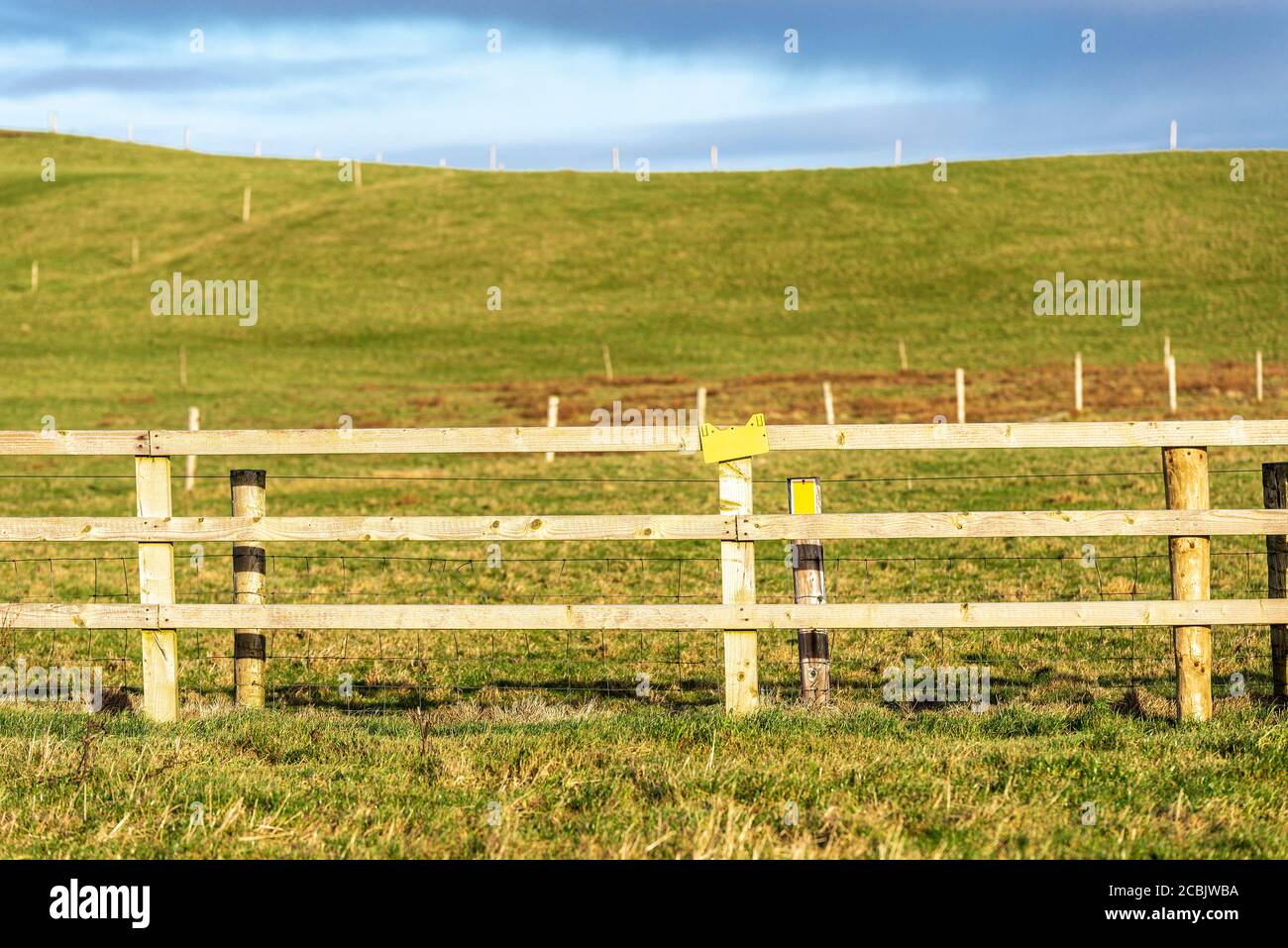 Electric fence for livestock on a prairie on the cliffs of Moher in County Clare, province of Munster, Ireland Stock Photo