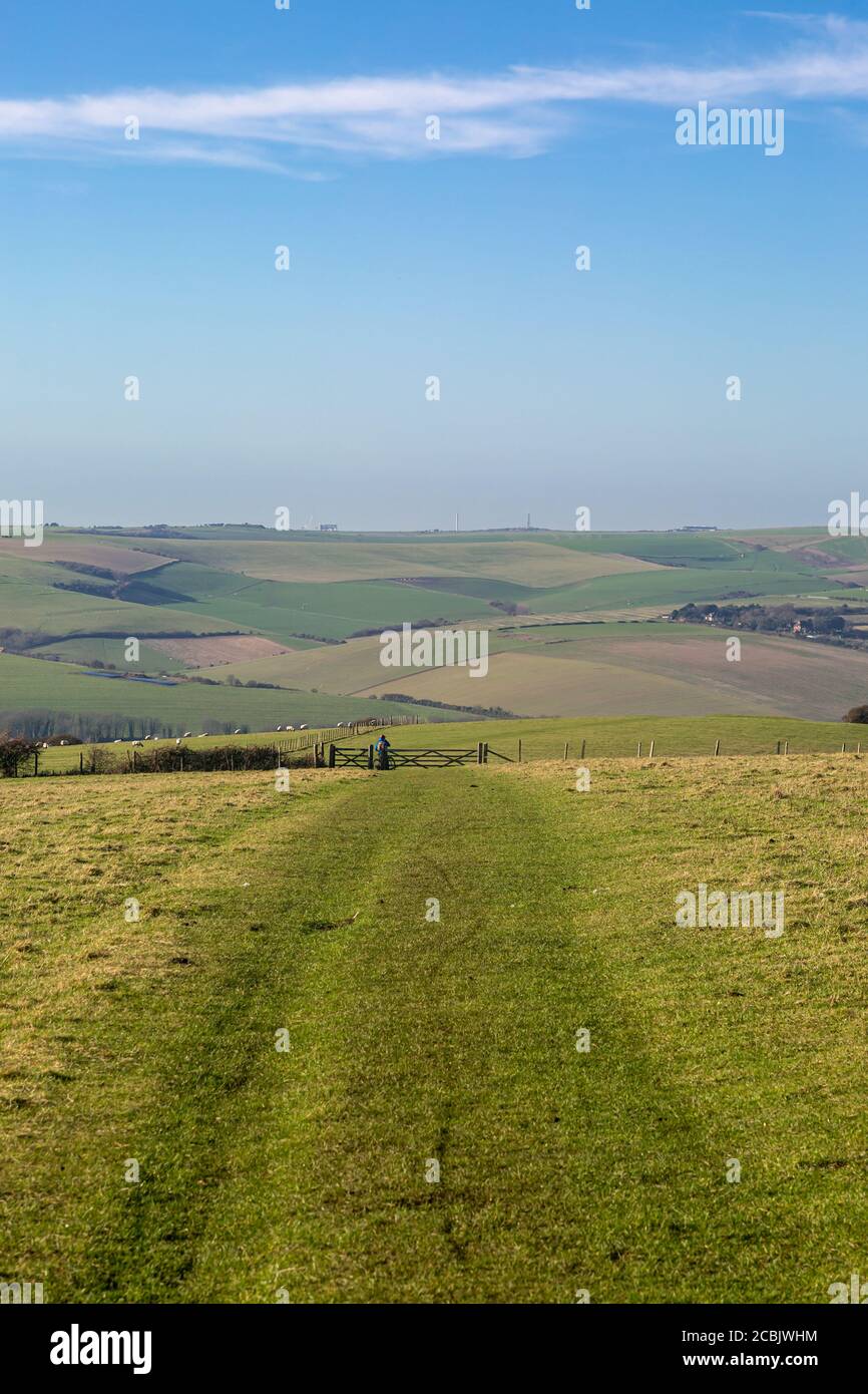 A pathway in the South Downs with a view of an idyllic Sussex landscape Stock Photo