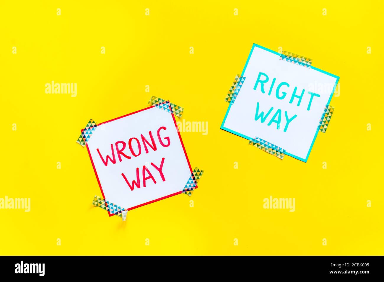 Problem solving. Right and wrong way icons on work desk from above ...