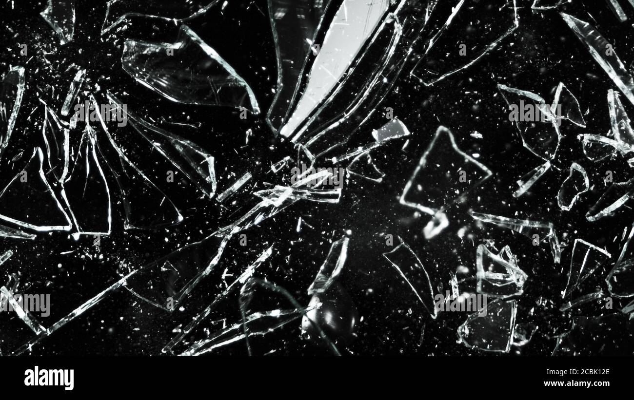 Detail of shattered glass on black background. Texture of broken glass  Stock Photo - Alamy