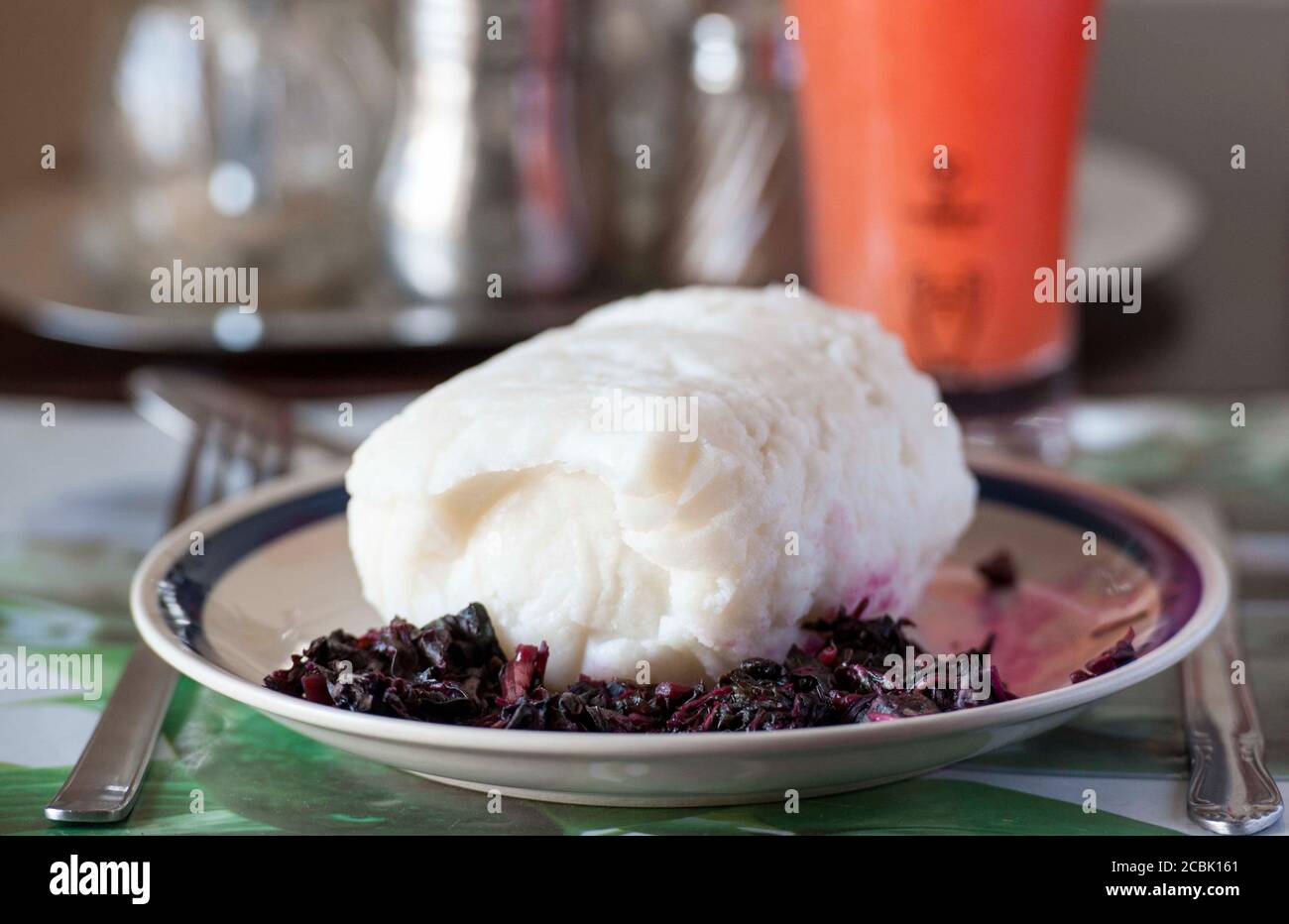 Nsima, also known as ugali or posho, is a main meal for millions of people in sub-Saharan Africa. It is mainly made from maize flour Stock Photo